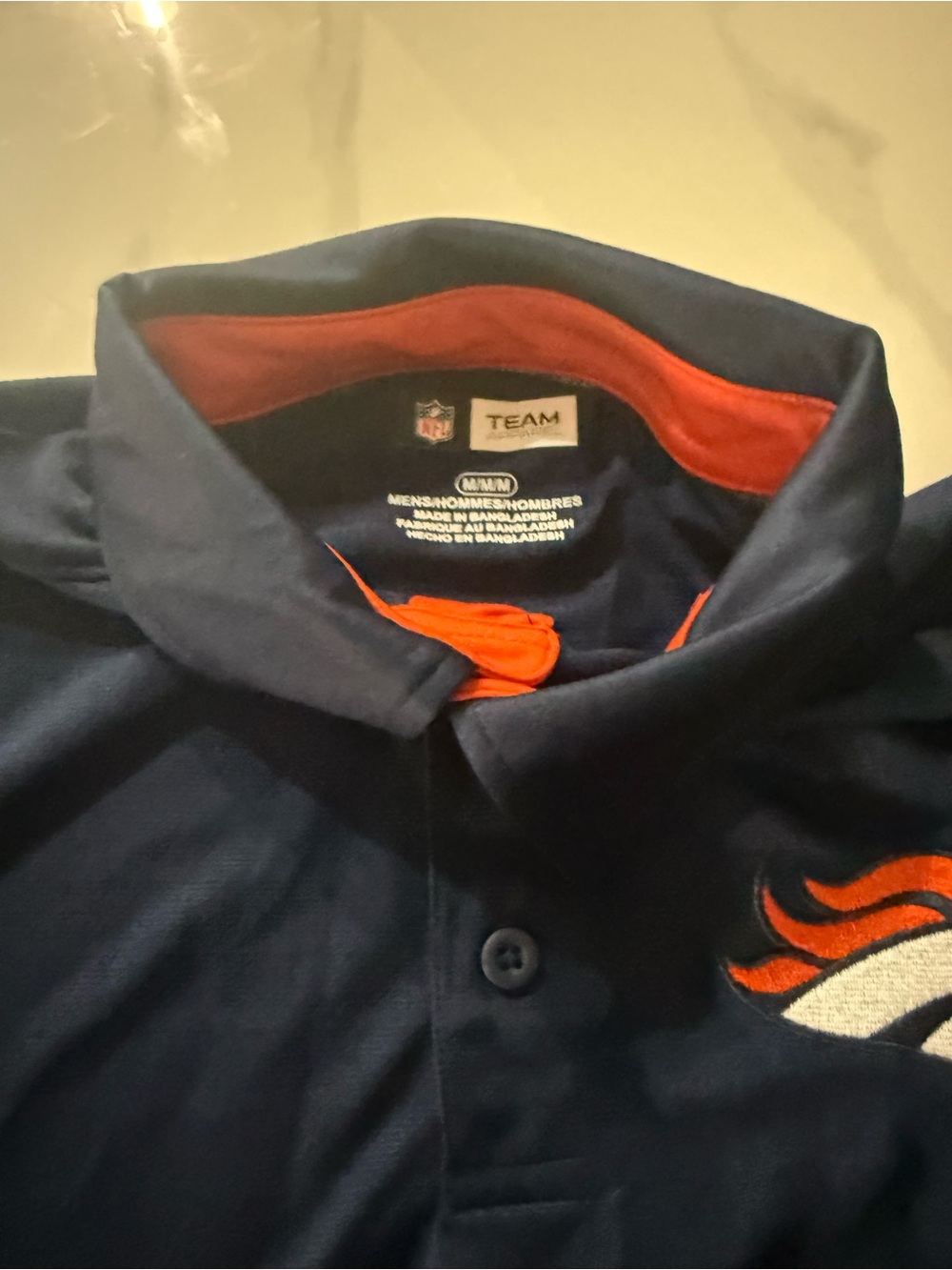 NFL Navy Polo with Bright Orange Trim and Embroidered Logo